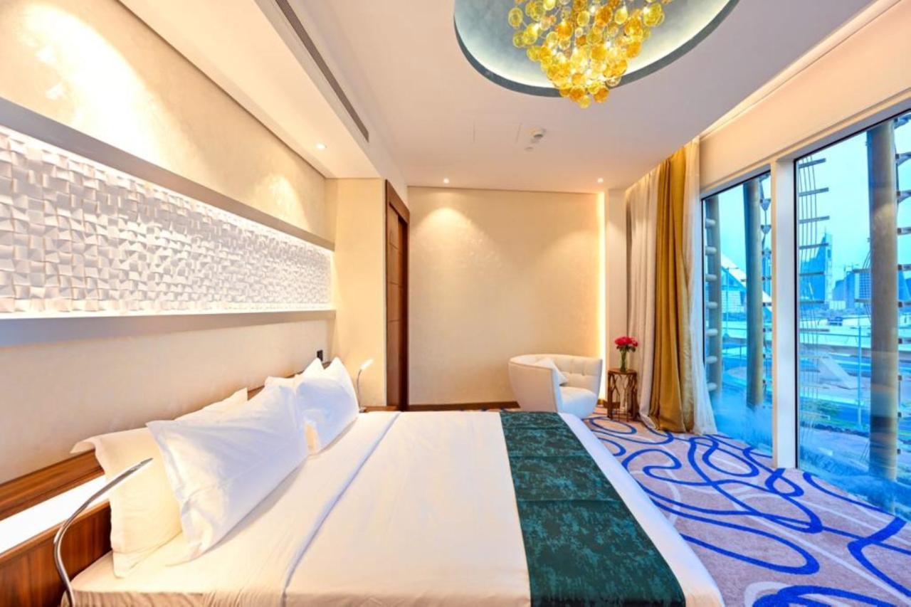 Cielo Hotel Lusail Qatar Buitenkant foto A bedroom at the hotel