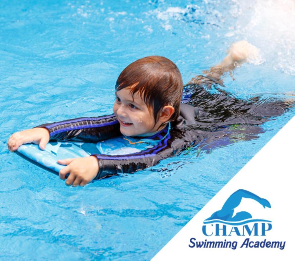 Cielo Hotel Lusail Qatar Buitenkant foto Child swimming with a float