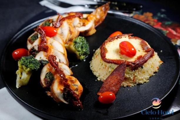 Cielo Hotel Lusail Qatar Buitenkant foto Octopus with couscous